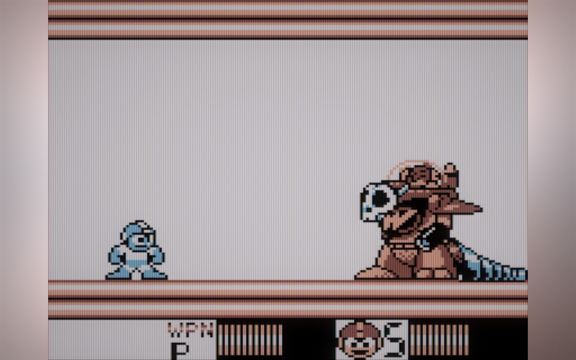 Wily&rsquo;s machine is a strange dinosaur, and Wily himself is very small inside