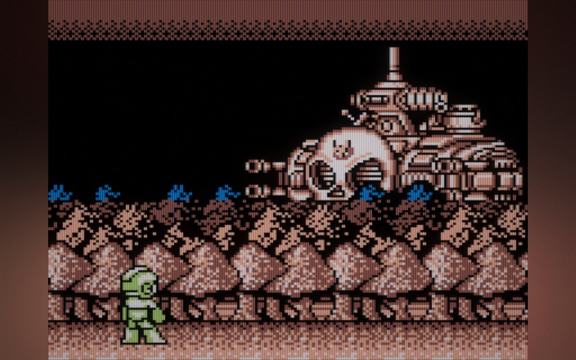 At the start of the Wily stages, there&rsquo;s a weird cutscene where Mega Man fights the fortress from a distance